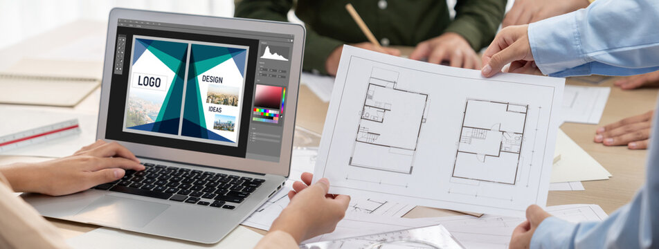 Graphic designer software for modern design of web page and commercial brisk ads showing on the computer screen