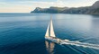 © DH - Beautiful white sailboat glides across the calm blue sea, leaving a wake, with majestic coastal cliffs in the background, perfect for summer travel and leisure.