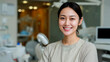© HA - Smiling Female Dentist in Dental Clinic Professional Healthcare Portrait