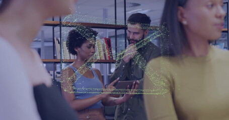 Poster - Pointing woman wearing blue top showing tablet to white man in office library, with bookshelves