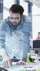 Poster - Animation of multiple icons over diverse male architects discussing blueprint in office