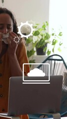 Poster - Animation of icons and data processing over caucasian woman using laptop