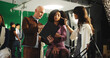 © peopleimages.com - People, makeup and artist with clipboard on set with scene notes, feedback and director advice. Team, cosmetics and preparation with supervisor of movie production, performance guide and script lines