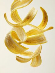 Poster - Unique Abstract Composition Featuring Banana Peels Against a Clean White Background