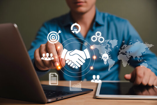 Man touching handshake icon with global business graphics