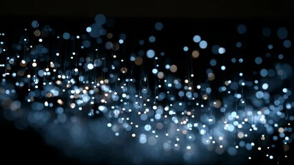 Poster - Dynamic sparkling light particles floating in the dark with glowing bokeh effect
