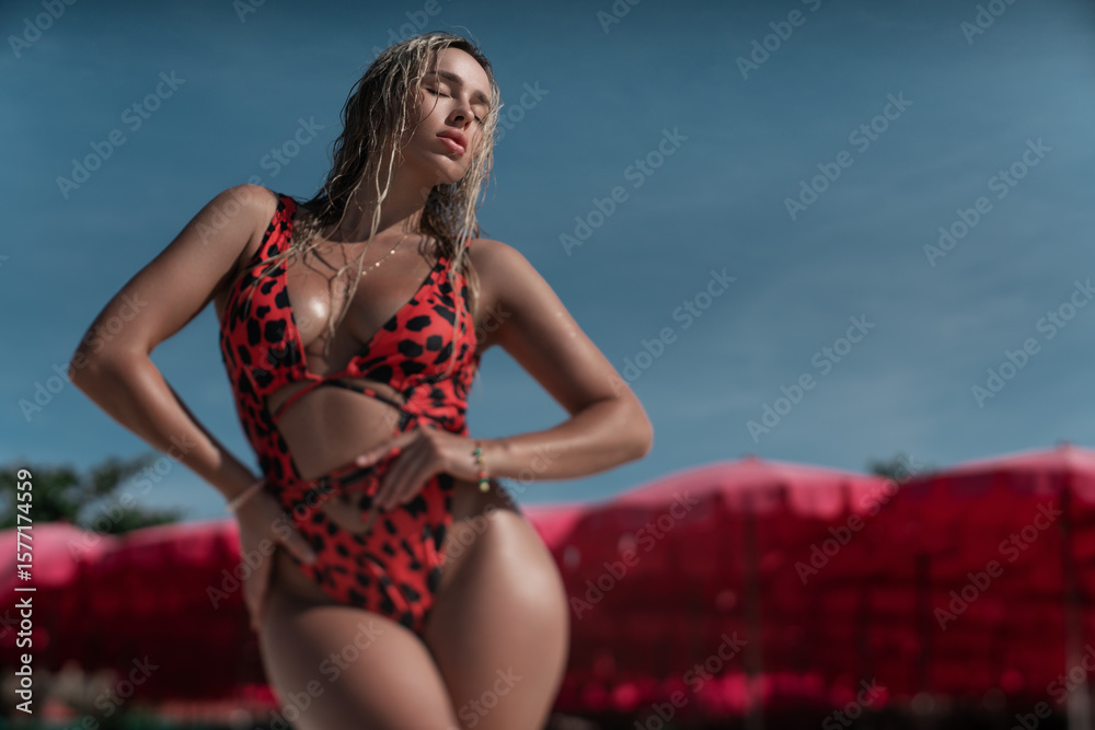 Beautiful and sexy girl posing in threesome against the background of water in a swimsuit Stock Photo | Adobe Stock Beautiful and sexy girl posing in threesome against the background of water in a swimsuit Stock Photo | Adobe Stock