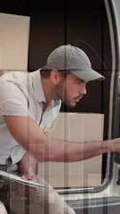Poster - Animation of data processing over man packing boxes into car