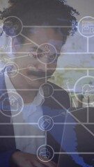 Poster - Animation of network of connections with world map over african american man using laptop
