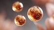 © BOJOShop - Three amber liquid spheres containing small bubbles float against a soft grey background