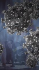 Poster - Digital animation of multiple cells floating against world map on blue background