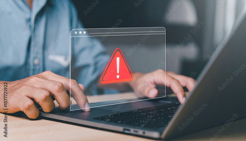 Help With Computer Not Available Sign A person is working on a laptop and receives a warning, indicating a ...
