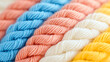 © SS Stock - Vibrant and colorful yarns neatly twisted together, perfect for knitting and crafting projects. Ideal for artistic inspirations.