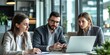 © Muhammad Hammad Zia - Professional business group brainstorming new project plan using laptop in meeting room, mixed gender team of office workers focused on collaborative success