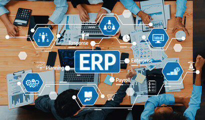 Poster - Business professionals collaborate in a modern office setting to analyze ERP strategies, showcasing data and technology integration for improved enterprise management. Amity