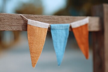 Poster - tri-color ribbons flying in wind near hand-painted sign