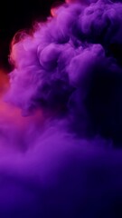Poster - Vibrant orange and purple smoke cloud gradually transforming across dark background, blending colors in mesmerizing abstract pattern with fluid motion and dynamic energy