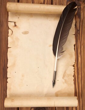 Antique Parchment Scroll with Black Quill Pen on Rustic Wooden Background