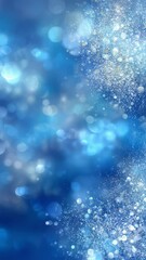 Poster - Silver particles falling gracefully against a vibrant blue bokeh background, creating a magical and festive atmosphere, perfect for holiday projects, celebrations, and special occasions