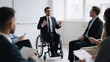 © komori - Business Meeting with Person in Wheelchair