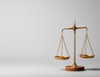 © muhammad - Antique gold balance scales on a gray background