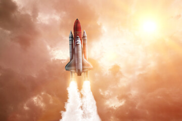 Wall Mural - modern space rocket in beautiful cloudy sky