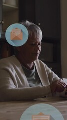 Poster - Animation of envelope icons in circles over senior woman scrolling on smartphone at home