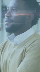 Poster - Animation of data processing over african american businessman