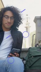Poster - Animation of eye icons over businessman using smartphone