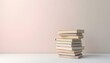 © Hairul - Minimalist Book Stack on White Table