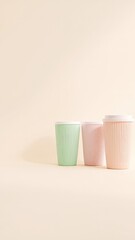 Poster - Three Pastel Colored Textured Cups Stand Together on a Light Beige Background with Copy Space Available