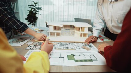 Poster - A group of architecture professionals engage in a collaborative workshop, analyzing blueprints and design plans in a bright modern office, showcasing teamwork and creativity. SACTR