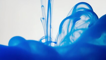 Aufkleber - Blue ink swirling in water creating abstract shapes and patterns