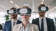 © Johannes - Business people wearing vr goggles inside business office - Future concept, no logos, no brands