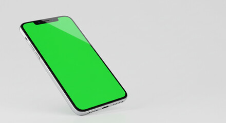 Poster - Silver smartphone displaying a green screen on a white surface in a studio setting for product mockup