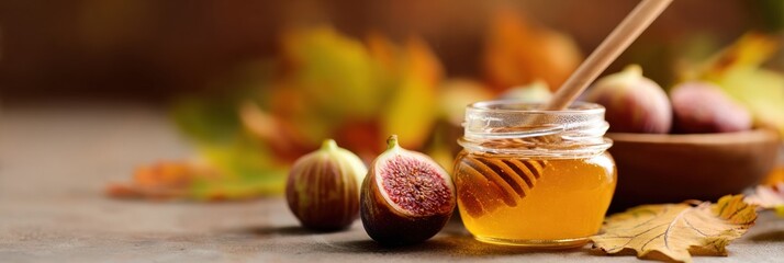 Poster - Figs and Honey Create a Warm Autumn Ambiance With Soft Blurred Background and Vibrant Leaves