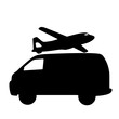 © Iryna - Silhouette of van with airplane icon, intermodal transport concept, black and white