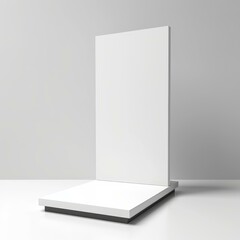 Poster - White vertical banner standing on a white pedestal with a dark gray base in a bright studio setting, ideal for showcasing designs or branding