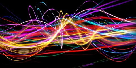 Poster - Vibrant Multicolored Light Trails on Black Background