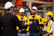 © NVB Stocker - Ethnic diversity worker people, Success teamwork. Group of professional engineering people wearing hardhat safety helmet meeting. Communication Morning Brief. metal sheet profiling factory