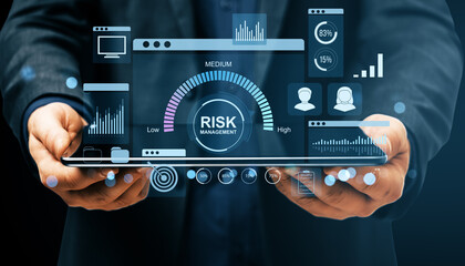 Poster - Businessperson holding tablet with digital interface displaying risk management dashboard and financial data analysis concept in modern fintech software.