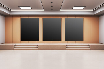 Poster - Three vertical black poster frames on modern exhibition stage wall in clean museum interior with light ceiling and minimalist display scene. 3D Rendering