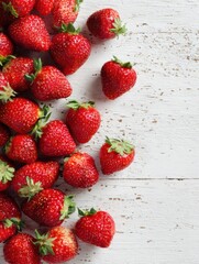 Poster - Fresh Strawberries Scattered on a Light Wooden Background With a Clean Top Right Area for an Appealing Look and Natural Feel