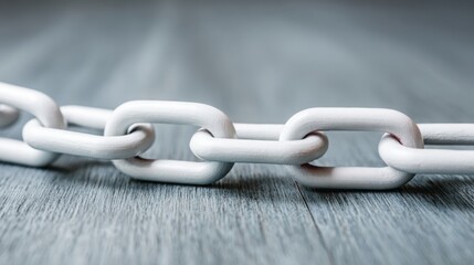 Poster - Rustic wooden table featuring a chain link representing strong connections and values in a strategic cultural context