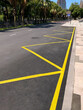 © SKfoto - Road sign, yellow markings, public transport stop.
