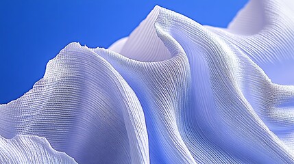 Poster - Woven texture rising peaks and valleys against the azure sky suggestive of sculptural elegance