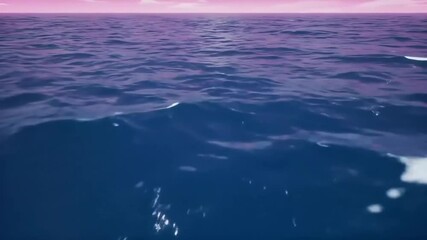 a serene, rippled ocean under a pink, cloudy sky