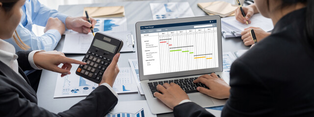 Poster - Business intelligence and data analysis concept. Analyst team working on financial data analysis dashboard on laptop screen as marketing indication for effective business strategic planning. Insight