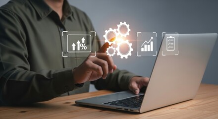 Fototapete - Man using laptop with digital icons representing growth automation and productivity in the workplace