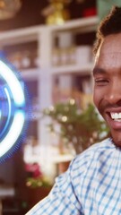 Poster - Animation of scope scanning over african american man using smartphone